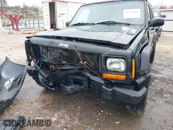 1999 Jeep Cherokee Sport with VIN 1J4FT68S6XL598558, listed as a IAAI auction lot 41549504 with 238,004 mi miles. Bid and sale history available at carsss.com. Image 12.