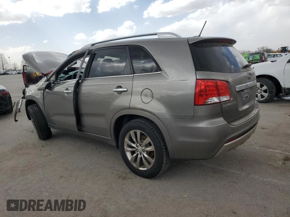 2012 Kia Sorento SX with VIN 5XYKW4A24CG243176, listed as a Copart auction lot 49816515 with 186,540 mi miles and Salvage Title. Bid and sale history available at carsss.com. Image 2.