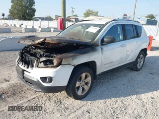 2014 Jeep Compass Sport with VIN 1C4NJDBB3ED892141, listed as a IAAI auction lot 40572980 with 95,826 mi miles. Bid and sale history available at carsss.com. Image 2.