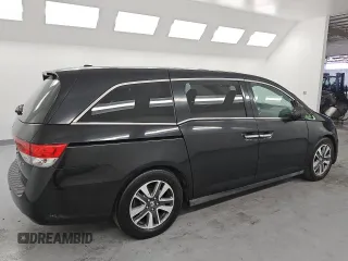 2015 Honda Odyssey Touring Elite with VIN 5FNRL5H95FB017434, listed as a Copart auction lot 55011035 with 111,254 mi miles and Clean title. Bid and sale history available at DreamBid. Image 3.