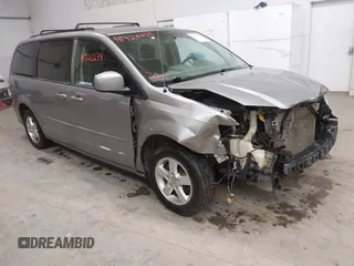2013 Dodge Grand Caravan SXT with VIN 2C4RDGCG9DR655119, listed as a IAAI auction lot 41726639 with 187,070 mi miles and . Bid and sale history available at DreamBid. Image 1.