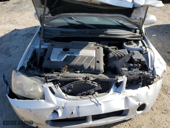 2006 Kia Spectra with VIN KNAFE161965323828, listed as a Copart auction lot 69583934 with 152,000 mi miles and Salvage Title. Bid and sale history available at carsss.com. Image 12.