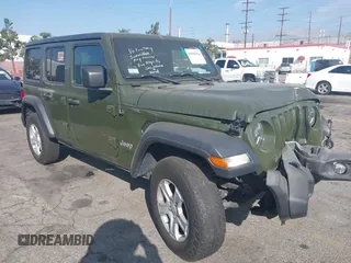 2021 Jeep Wrangler Unlimited Willys Sport with VIN 1C4HJXDG2MW636518, listed as a IAAI auction lot 40385924 with 48,827 mi miles and . Bid and sale history available at DreamBid. Image 1.