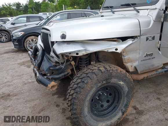 2004 Jeep Wrangler X with VIN 1J4FA39S24P701806, listed as a IAAI auction lot 42218100 with 72,757 mi miles and . Bid and sale history available at DreamBid. Image 6.
