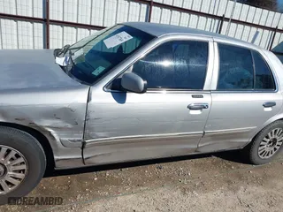 2007 Mercury Grand Marquis LS with VIN 2MEFM75V77X601170, listed as a IAAI auction lot 41517369 with 210,800 mi miles. Bid and sale history available at carsss.com. Image 14.