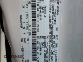 2014 Ford Focus Titanium z VIN 1FADP3N27EL161613, wystawiony jako Copart lot #56166805 z przebiegiem 140 336 mil mil oraz Szkoda całkowita • Salvage title. Historia ofert i sprzedaży dostępna na DreamBid. Obrazek 14.