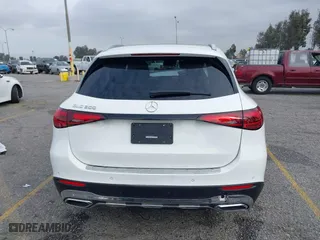 2025 Mercedes-Benz GLC with VIN W1NKM4GB8SF245147, listed as a IAAI auction lot 41207989 with 1,105 mi miles. Bid and sale history available at carsss.com. Image 16.