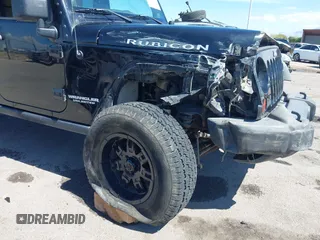 2011 Jeep Wrangler Unlimited Rubicon с VIN 1J4HA6H11BL641492, выставлен на аукционе IAAI как лот 42402713 с пробегом 112 156 миль миль и . История ставок и продаж доступна на DreamBid. Изображение 6.