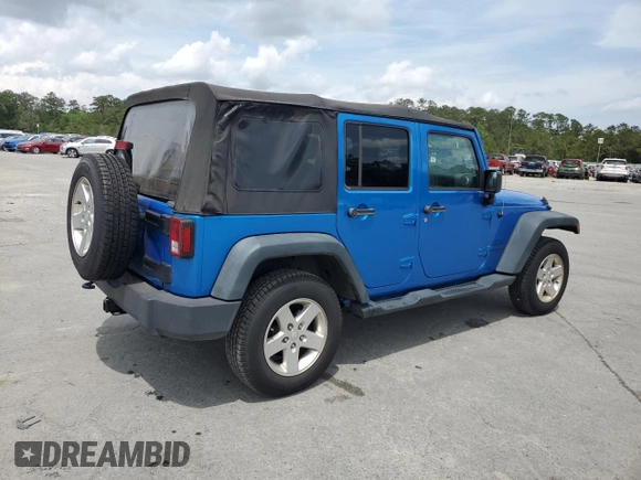 2015 Jeep Wrangler Unlimited Willys Wheeler with VIN 1C4BJWDG4FL611656, listed as a Copart auction lot 54010395 with 129,797 mi miles and Salvage Title. Bid and sale history available at DreamBid. Image 3.