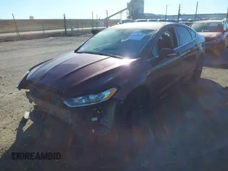 2016 Ford Fusion SE with VIN 3FA6P0H77GR177295, listed as a IAAI auction lot 41433555 with 133,519 mi miles. Bid and sale history available at carsss.com. Image 2.