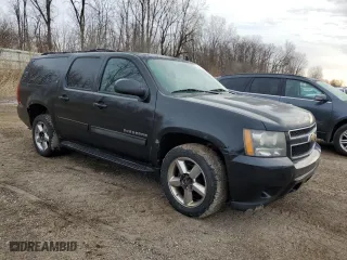 2011 Chevrolet Suburban LT with VIN 1GNSKJE33BR389346, listed as a Copart auction lot 48250195 with 217,815 mi miles and Salvage Title. Bid and sale history available at carsss.com. Image 4.