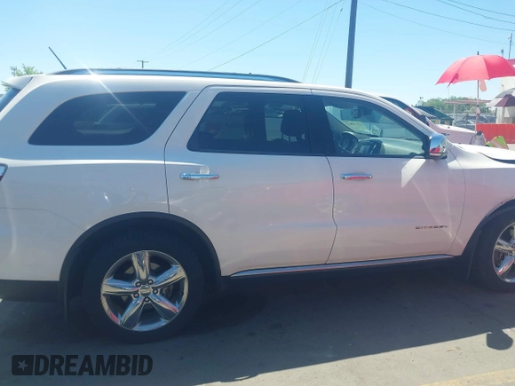 2012 Dodge Durango Citadel with VIN 1C4SDJET0CC100625, listed as a IAAI auction lot 42170821 with 130,866 mi miles and . Bid and sale history available at DreamBid. Image 13.