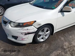 2009 Acura TSX with VIN JH4CU26609C014399, listed as a IAAI auction lot 42619619 with 153,543 mi miles and . Bid and sale history available at DreamBid. Image 6.