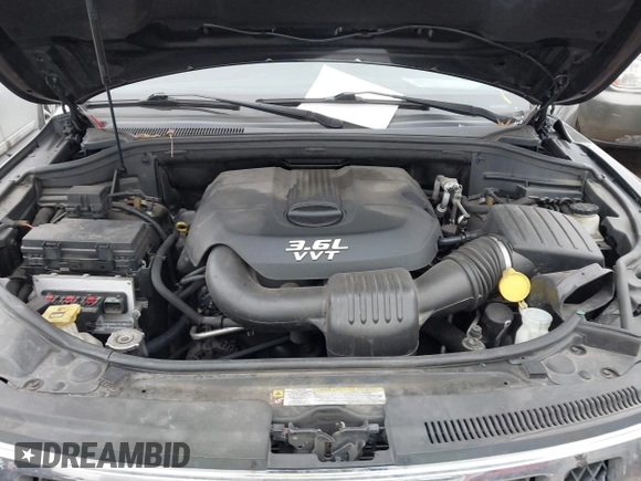 2013 Jeep Grand Cherokee Overland with VIN 1C4RJFCG1DC593890, listed as a IAAI auction lot 41264434 with 204,324 mi miles. Bid and sale history available at carsss.com. Image 10.