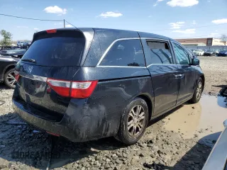 2011 Honda Odyssey EX-L with VIN 5FNRL5H69BB080861, listed as a Copart auction lot 53690005 with 206,646 mi miles and Salvage Title. Bid and sale history available at DreamBid. Image 3.