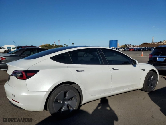 2023 Tesla Model 3 with VIN 5YJ3E1EA6PF500889, listed as a Copart auction lot 41895865 with 15,199 mi miles and Salvage Title. Bid and sale history available at carsss.com. Image 3.