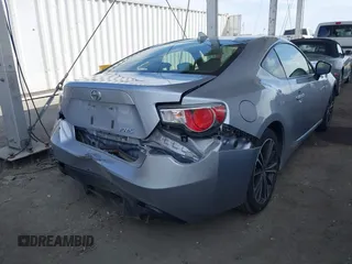 2015 Scion FR-S with VIN JF1ZNAA19F9713270, listed as a IAAI auction lot 42023440 with 79,121 mi miles. Bid and sale history available at carsss.com. Image 4.