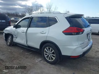 2017 Nissan Rogue S with VIN JN8AT2MVXHW017964, listed as a IAAI auction lot 41869965 with 123,544 mi miles and . Bid and sale history available at DreamBid. Image 3.