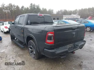 2021 Ram 1500 Limited with VIN 1C6SRFHT3MN500590, listed as a IAAI auction lot 41117602 with 81,875 mi miles and . Bid and sale history available at DreamBid. Image 3.