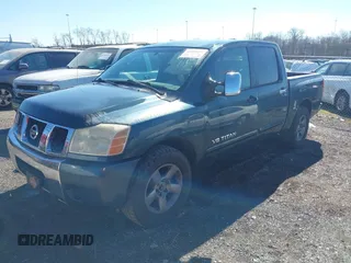 2005 Nissan Titan XE with VIN 1N6AA07A65N512479, listed as a IAAI auction lot 41659482 with 225,037 mi miles and . Bid and sale history available at DreamBid. Image 2.