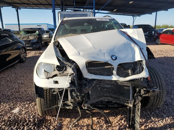 2013 BMW X5 xDrive50i with VIN 5UXZV8C55D0C16304, listed as a Copart auction lot 53406135 with 103,704 mi miles and Salvage title. Bid and sale history available at DreamBid. Image 5.