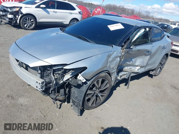 2016 Nissan Maxima SV z VIN 1N4AA6AP4GC446635, wystawiony jako IAAI lot #41672861 z przebiegiem 118 377 mil mil oraz . Historia ofert i sprzedaży dostępna na DreamBid. Obrazek 18.