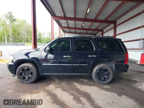 2009 Chevrolet Tahoe LTZ z VIN 1GNFK330X9R219064, wystawiony jako IAAI lot #42261154 z przebiegiem 125 511 mil mil oraz . Historia ofert i sprzedaży dostępna na DreamBid. Obrazek 14.