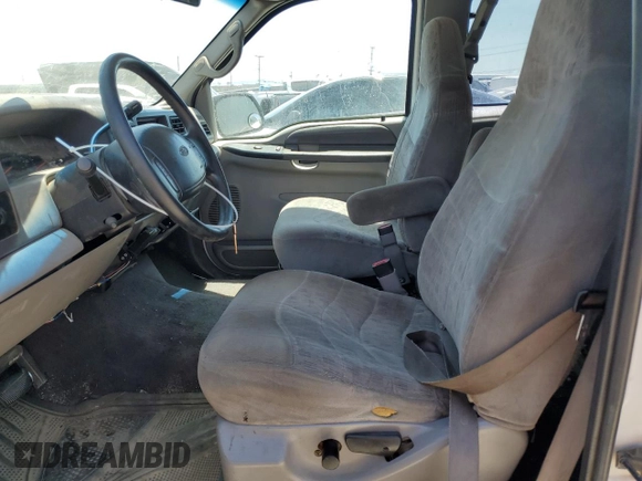 1999 Ford F-250 XL with VIN 1FTNX20L8XEB01923, listed as a Copart auction lot 65404495 with 383,297 mi miles and Salvage title. Bid and sale history available at DreamBid. Image 7.