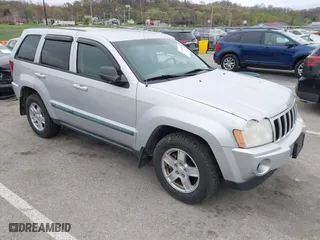 2007 Jeep Grand Cherokee Laredo with VIN 1J8GR48K47C687339, listed as a IAAI auction lot 41904034 with 158,661 mi miles. Bid and sale history available at carsss.com. Image 1.