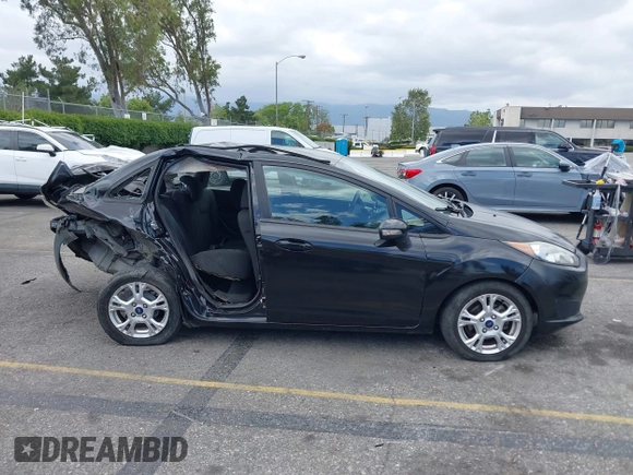 2014 Ford Fiesta SE z VIN 3FADP4BJ0EM216922, wystawiony jako IAAI lot #42255776 z przebiegiem 87 371 mil mil oraz . Historia ofert i sprzedaży dostępna na DreamBid. Obrazek 14.