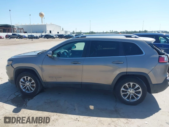 2019 Jeep Cherokee Latitude Plus with VIN 1C4PJMLBXKD233749, listed as a IAAI auction lot 41937698 with 103,988 mi miles and . Bid and sale history available at DreamBid. Image 15.