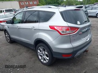 2015 Ford Escape Titanium z VIN 1FMCU9J91FUA85771, wystawiony jako IAAI lot #42306986 z przebiegiem 135 787 mil mil oraz . Historia ofert i sprzedaży dostępna na DreamBid. Obrazek 3.