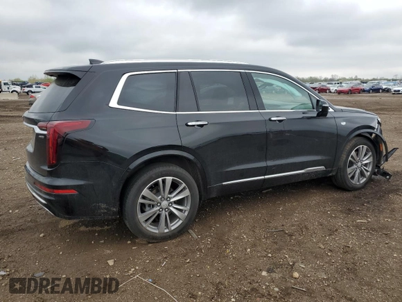 2022 Cadillac XT6 Premium Luxury z VIN 1GYKPFRS9NZ103281, wystawiony jako Copart lot #55118485 z przebiegiem 52 413 mil mil oraz Szkoda całkowita • Salvage title. Historia ofert i sprzedaży dostępna na DreamBid. Obrazek 3.