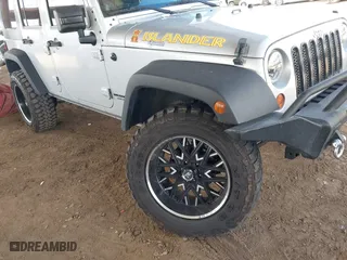 2010 Jeep Wrangler Unlimited Sport with VIN 1J4BA3H18AL161243, listed as a IAAI auction lot 41960370 with 89,004 mi miles. Bid and sale history available at carsss.com. Image 6.