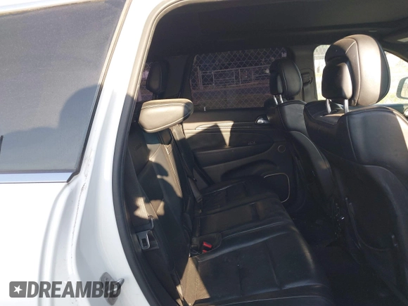 2015 Jeep Grand Cherokee Summit with VIN 1C4RJFJT5FC767687, listed as a IAAI auction lot 42015878 with 1 mi miles. Bid and sale history available at carsss.com. Image 8.
