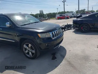 2011 Jeep Grand Cherokee Overland with VIN 1J4RS6GT4BC584029, listed as a IAAI auction lot 42088953 with 144,777 mi miles and . Bid and sale history available at DreamBid. Image 5.