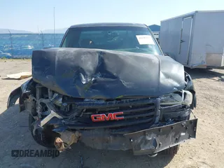 2003 GMC Sierra 1500 SLT z VIN 1GTEK19T03E191705, wystawiony jako IAAI lot #42145392 z przebiegiem Nie podano mil oraz . Historia ofert i sprzedaży dostępna na DreamBid. Obrazek 13.
