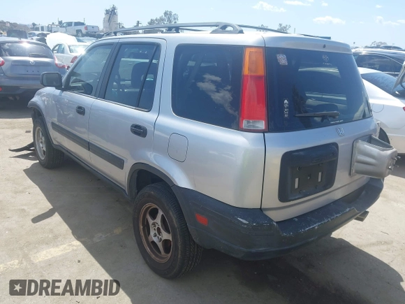 2001 Honda CR-V LX with VIN JHLRD18431C015913, listed as a IAAI auction lot 41953334 with 185,626 mi miles. Bid and sale history available at carsss.com. Image 3.
