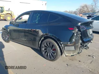 2022 Tesla Model Y Performance with VIN 7SAYGDEF0NF447541, listed as a IAAI auction lot 41762592 with 41,204 mi miles and . Bid and sale history available at DreamBid. Image 3.
