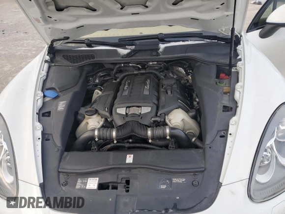 2012 Porsche Cayenne Turbo z VIN WP1AC2A23CLA83951, wystawiony jako Copart lot #82380594 z przebiegiem Nie podano mil oraz Szkoda całkowita • Salvage title. Historia ofert i sprzedaży dostępna na DreamBid. Obrazek 13.