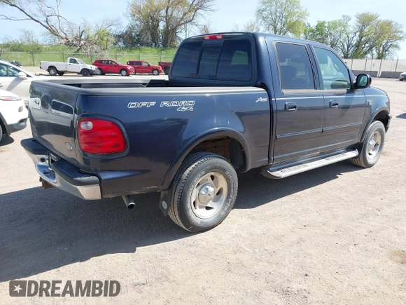 2001 Ford F-150 XLT with VIN 1FTRW08L71KA41543, listed as a IAAI auction lot 42205400 with 69,454 mi miles and . Bid and sale history available at DreamBid. Image 4.
