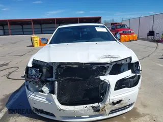 2011 Chrysler 300 with VIN 2C3CA6CTXBH559626, listed as a IAAI auction lot 41876062 with 112,045 mi miles. Bid and sale history available at carsss.com. Image 13.
