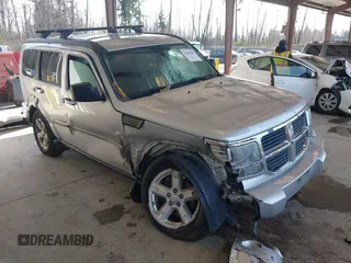 2007 Dodge Nitro SLT with VIN 1D8GU58K97W616701, listed as a IAAI auction lot 41666666 with 174,052 mi miles. Bid and sale history available at carsss.com. Image 1.