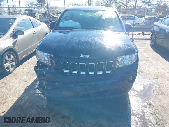 2011 Jeep Compass with VIN 1J4NF1FB6BD180447, listed as a IAAI auction lot 41575014 with 130,694 mi miles. Bid and sale history available at carsss.com. Image 12.