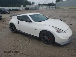 2014 Nissan 370Z with VIN JN1AZ4EH2EM633845, listed as a Copart auction lot 63583194 with 0 mi miles and Salvage Title. Bid and sale history available at carsss.com. Image 4.