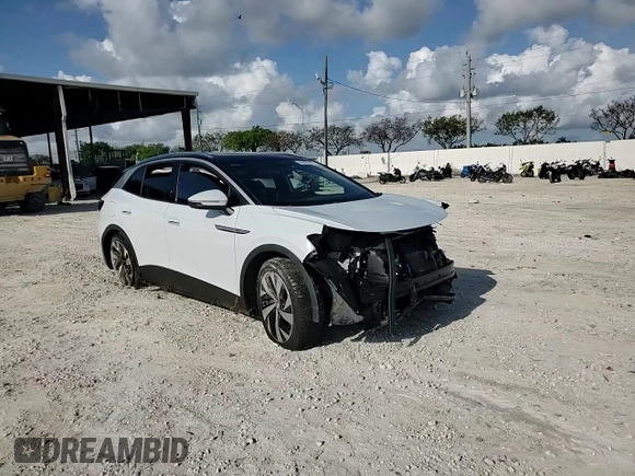 2021 Volkswagen ID.4 Pro S z VIN WVGKMPE23MP057771, wystawiony jako Copart lot #55903545 z przebiegiem 63 522 mil mil oraz Nie do naprawy • Non repairable. Historia ofert i sprzedaży dostępna na DreamBid. Obrazek 14.