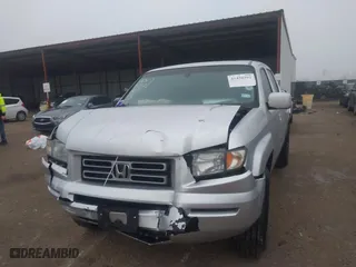 2006 Honda Ridgeline RTL with VIN 2HJYK16526H531190, listed as a IAAI auction lot 41450393 with 146,646 mi miles. Bid and sale history available at carsss.com. Image 2.