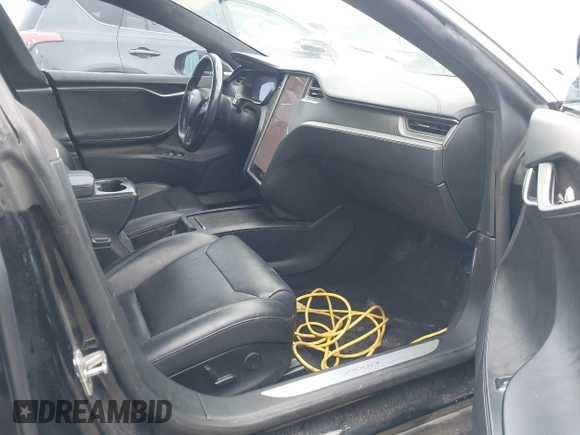 2018 Tesla Model S 75D with VIN 5YJSA1E42JF265691, listed as a IAAI auction lot 41886105 with 99,485 mi miles and . Bid and sale history available at DreamBid. Image 5.
