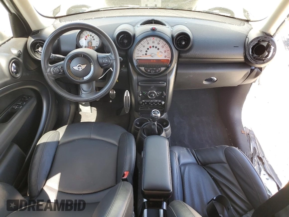 2013 MINI Countryman S ALL4 z VIN WMWZC5C56DWM16296, wystawiony jako Copart lot #56985615 z przebiegiem 63 858 mil mil oraz Szkoda całkowita • Salvage title. Historia ofert i sprzedaży dostępna na DreamBid. Obrazek 8.