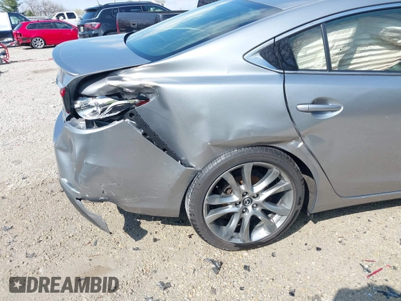 2015 Mazda 6 i Grand Touring with VIN JM1GJ1W52F1195333, listed as a IAAI auction lot 42014865 with 107,039 mi miles and . Bid and sale history available at DreamBid. Image 16.
